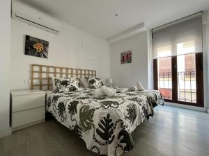 Postel nebo postele na pokoji v ubytování Casa Ribera LUCANO Centro Histórico