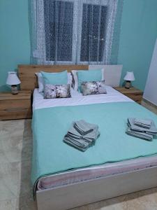 Postel nebo postele na pokoji v ubytování Aggeliki apartment