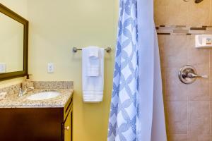 A bathroom at Pool and Screened-In Patio Tropical Florida Abode