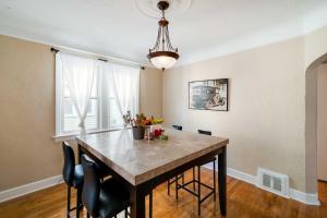a dining room with a table and chairs at Spacious Ferndale Apt with Yard about half Mi to Dtwn! in Ferndale