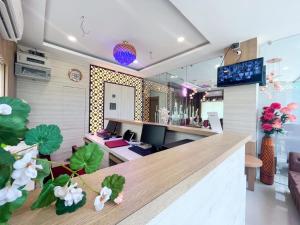 an office with a reception desk and a reception counter at AIR VALLEY INN in Guwahati