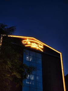 a building with a sign on the top of it at AIR VALLEY INN in Guwahati