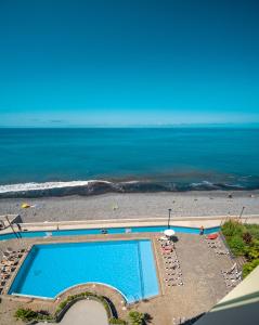 O vedere a piscinei de la sau din apropiere de Apartment Promenade Praia Formosa