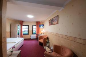 Posezení v ubytování Hotel Am Rathaus