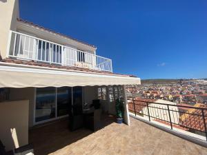 Balkón alebo terasa v ubytovaní The Feelgood House with jacuzzi and ocean view