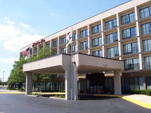 a hotel with two flags on top of it at Hampton Inn Chicago-Gurnee in Gurnee