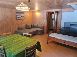 Postel nebo postele na pokoji v ubytování Ferienwohnung Berner Oberland - Guttannen