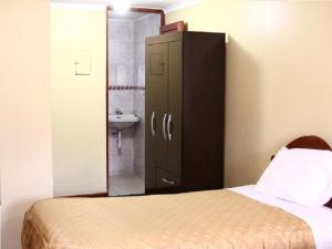 Katil atau katil-katil dalam bilik di Hostal Lucerito
