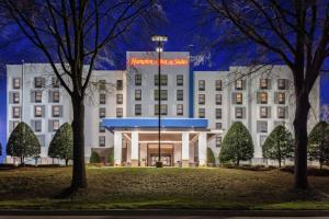 a rendering of the hilton garden inn at night at Hampton Inn & Suites Concord-Charlotte in Concord