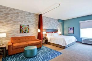 Home2 Suites By Hilton Charlotte Piper Glen客房内的一张或多张床位