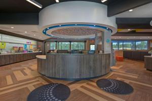 a lobby of a hospital with a reception counter at Tru By Hilton Mooresville in Mooresville