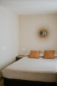 Posteľ alebo postele v izbe v ubytovaní Apartamentos Levante - Mares