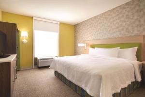 Postel nebo postele na pokoji v ubytování Home2 Suites By Hilton Columbus Dublin