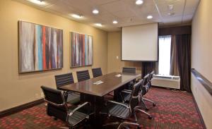 a conference room with a table and chairs at Hampton Inn Columbus-South in Grove City