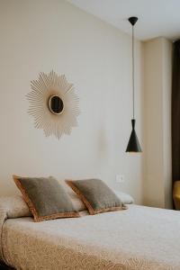Posteľ alebo postele v izbe v ubytovaní Apartamentos Levante - Mares