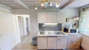 Kuchyň nebo kuchyňský kout v ubytování Ferienwohnung Kleissner