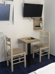 TV a/nebo společenská místnost v ubytování Apartmani Breze