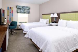 Postel nebo postele na pokoji v ubytování Hampton Inn and Suites Port Aransas