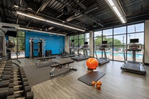 a gym with cardio equipment and an orange ball on the floor at Hampton Inn Christiansburg/Blacksburg in Christiansburg