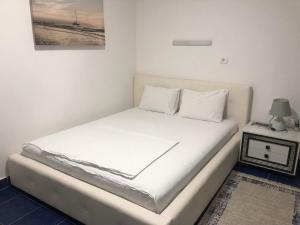 Posteľ alebo postele v izbe v ubytovaní Apartmani Breze
