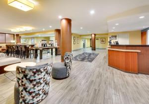 a lobby of a hospital with chairs and tables at Hampton Inn Los Angeles/Carson in Carson