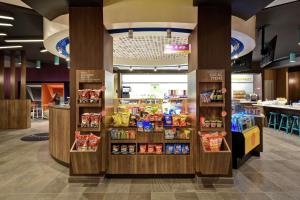 a grocery store with a display of food at Tru By Hilton Cincinnati Airport South Florence in Florence