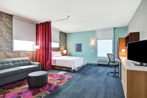 TV a/nebo společenská místnost v ubytování Home2 Suites By Hilton McKinney