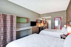 Postel nebo postele na pokoji v ubytování Home2 Suites By Hilton McKinney