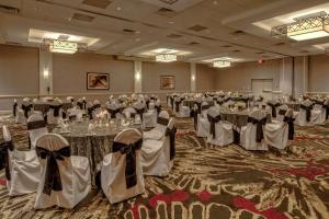 a large banquet room with tables and chairs at DoubleTree by Hilton Decatur Riverfront in Decatur