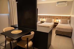 Cama ou camas em um quarto em Urbana Suites