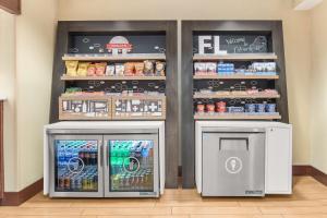 a grocery store with two refrigerators in a store at Hampton Inn Debary-Deltona in DeBary