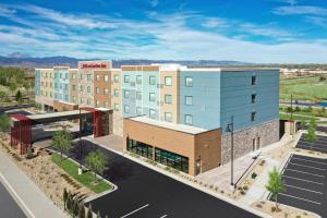 an overhead view of a building with a parking lot at Hilton Garden Inn Longmont in Longmont