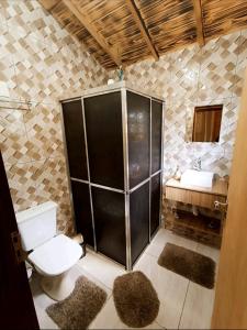 Ένα μπάνιο στο Chalé Quiosque Família tucano