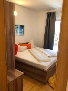 Postel nebo postele na pokoji v ubytování Appartements Antunovic