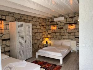 Postel nebo postele na pokoji v ubytování ALAÇATI XL LUXURY HOTEL