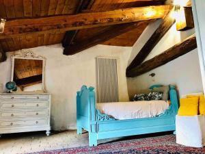 Ένα ή περισσότερα κρεβάτια σε δωμάτιο στο Cento Giorni dall'Artista