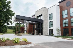 a building with a sign that reads reynolds hall at Revel Hotel, Tapestry Collection By Hilton in Urbandale