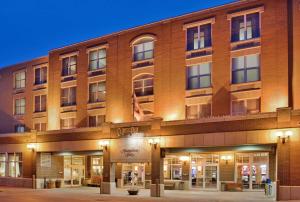 a large brick building with a sign on it at Hampton Inn at Tin Lizzie Gaming Resort in Deadwood