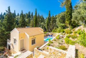 an image of a villa with a swimming pool at Villa Alexandros in Gaios