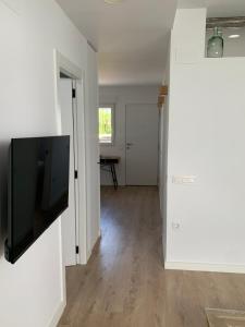 TV a/nebo společenská místnost v ubytování DeCASTA