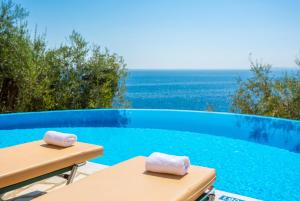 The swimming pool at or close to Villa Petros