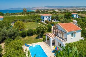 an aerial view of a villa with a swimming pool at Sun Beach Villa Thio in Polis Chrysochous