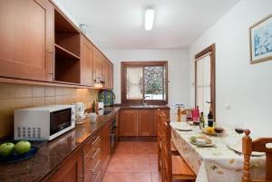 Kuchyň nebo kuchyňský kout v ubytování Villa Julianne 4
