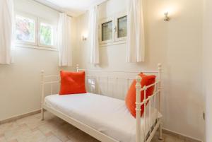 A bed or beds in a room at Villa Semeli Még 37 kép