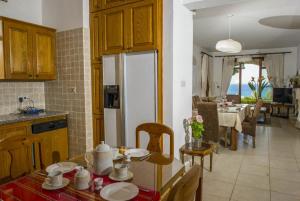 Kuchyň nebo kuchyňský kout v ubytování Villa Minoas