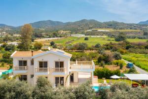 a villa with a view of the mountains at Villa Rose in Paphos City