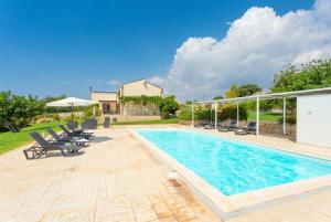 an image of a swimming pool in a house at Villa Palazzola in Scicli