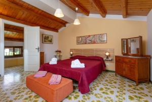 Postel nebo postele na pokoji v ubytování Villa Palazzola