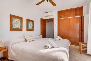 Postel nebo postele na pokoji v ubytování Villa Mari + 25 fotografií