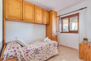 Postel nebo postele na pokoji v ubytování Villa Mari